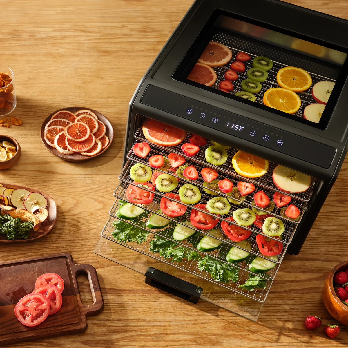 Excalibur DH06SS dehydrator with food on pulled out trays.