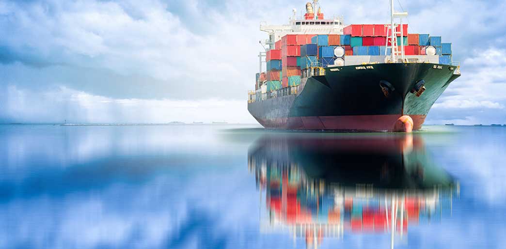 Container ship sailing across the sea.