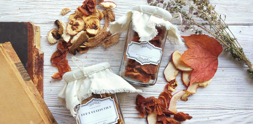 Assorted foods and spices on table, for dehydrating.