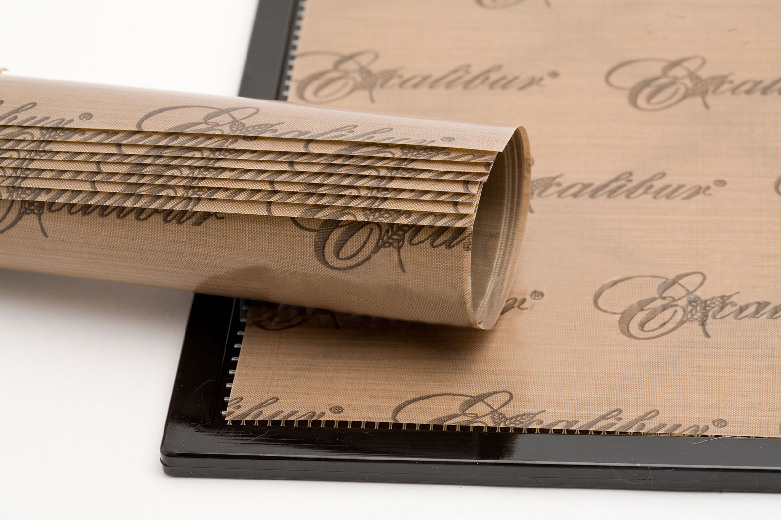 Paraflexx drying sheet placed on an Excalibur dehydrator tray.