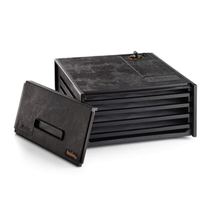 Excalibur 4400 4 tray compact dehydrator with door propped to the side and trays in.
