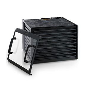 Excalibur 4926TCDB 9 tray dehydrator with clear door propped to the side and trays in.