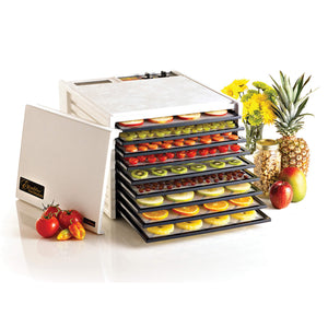 Excalibur 4926TW white 9 tray dehydrator with door propped to the side and food on the trays.