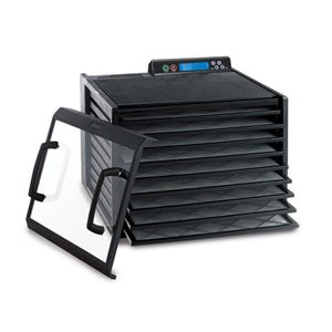 Excalibur 4948CDB 9 tray digital dehydrator with clear door propped to the isde and trays pulled out.