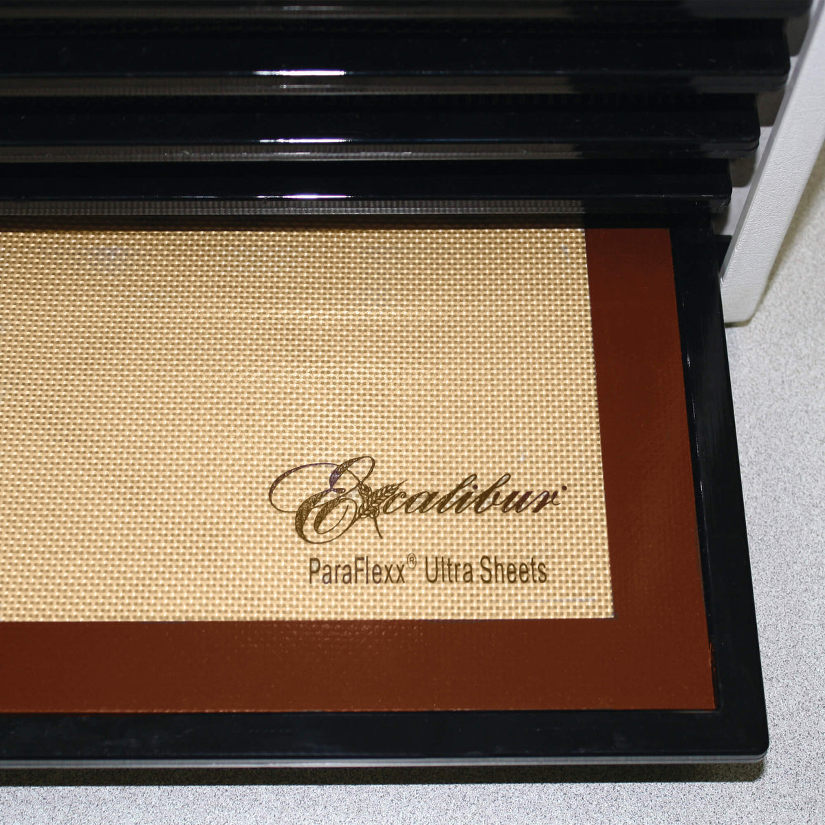 Excalibur Paraflexx Ultra silicone dehydrator drying sheet on a tray.